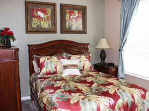 Queen Master Suite - Queen-size bed with a 32” Plasma TV and an adjacent full bath 